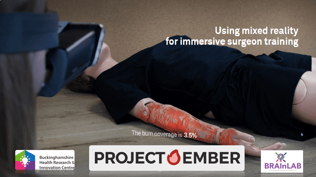 Project Ember banner showing a person in mixed reality training, viewing a simulated 3.5% burn on a medical mannequin's arm for surgeon education.