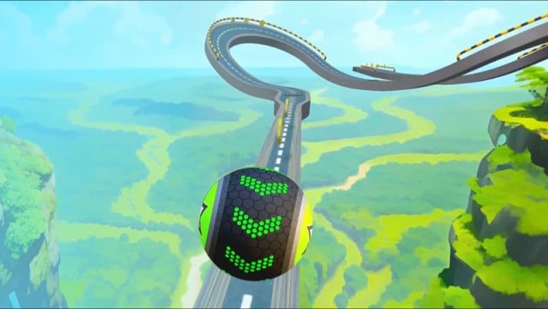 Скриншот 3D-игры, на котором круглый мяч движется по закрученной трассе на фоне живописного пейзажа.